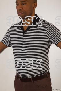 Upper black white striped shirt brown jeans of Arturo 0002